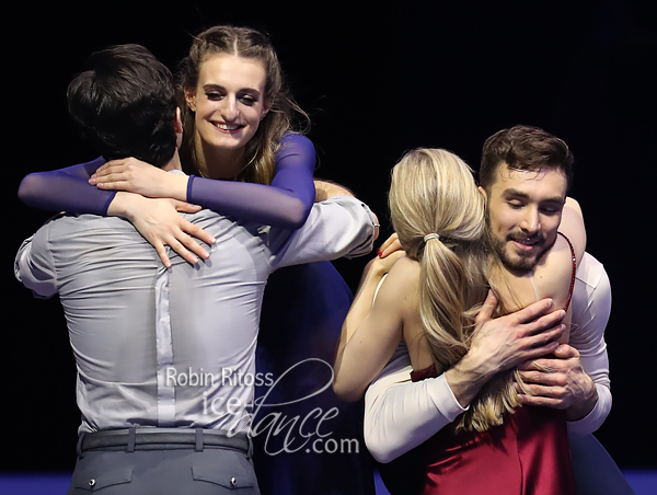 Hugs between Weaver & Poje and Papadakis & Cizeron